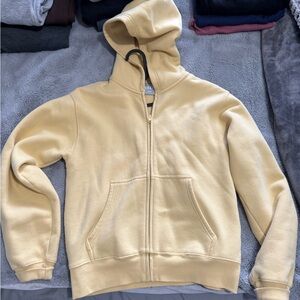 TNA cozy perfect zip up in light yellow